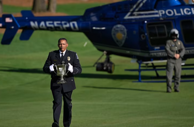 Rory McIlroy receives Wells Fargo trophy via helicopter in ceremony to honor fallen area police officers